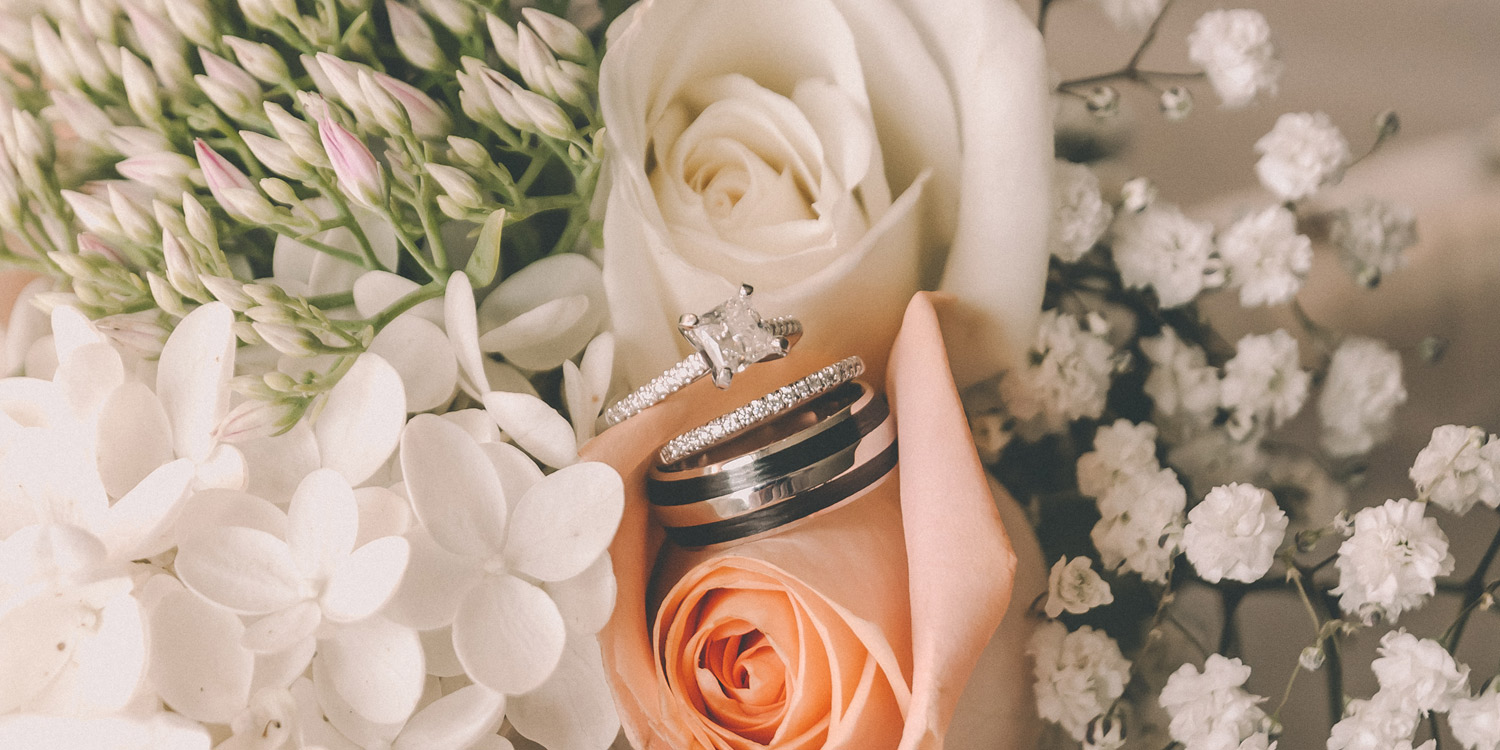 Borsheims engagement ring and wedding bands