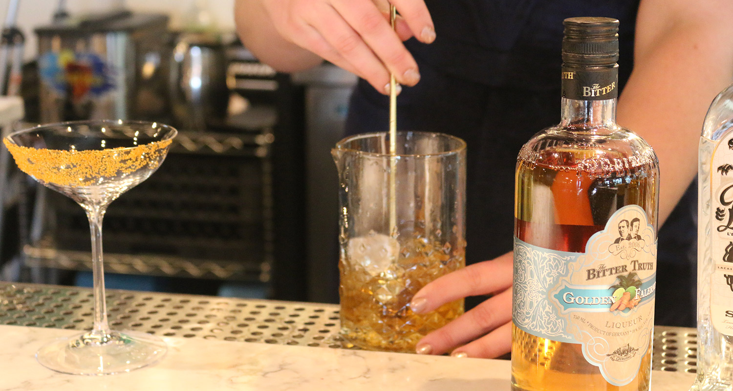 stirring the golden year cocktail