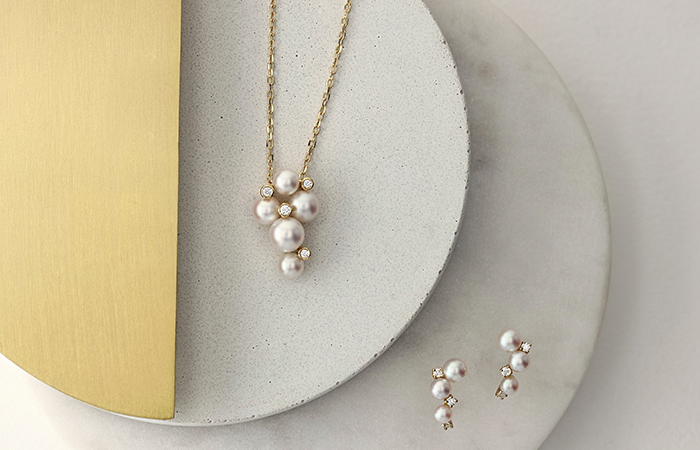 pearl diamond and gold necklace and earrings