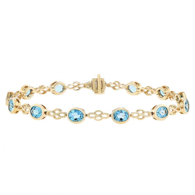 Oval Blue Topaz 13 Stone Lace Link Bracelet in Yellow Gold
