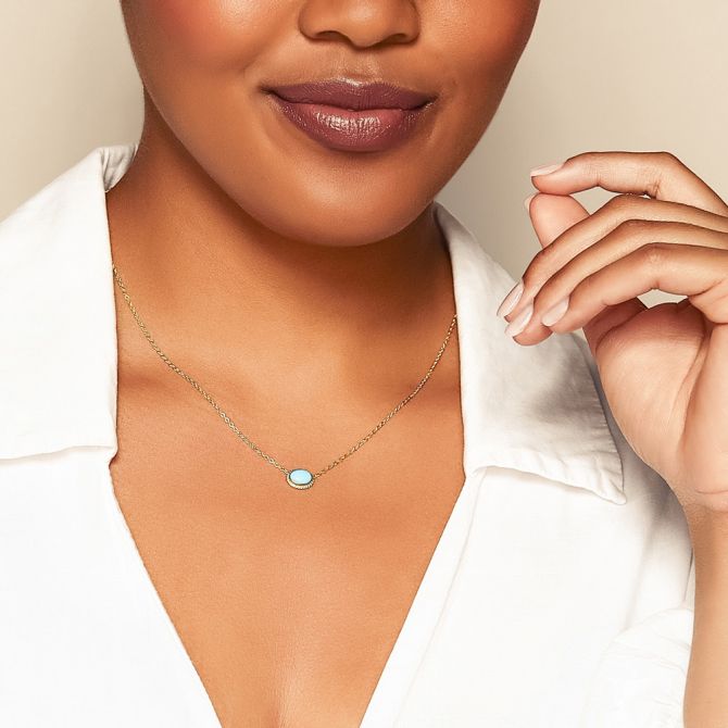 Borsheims cabochon turquoise necklace on female model