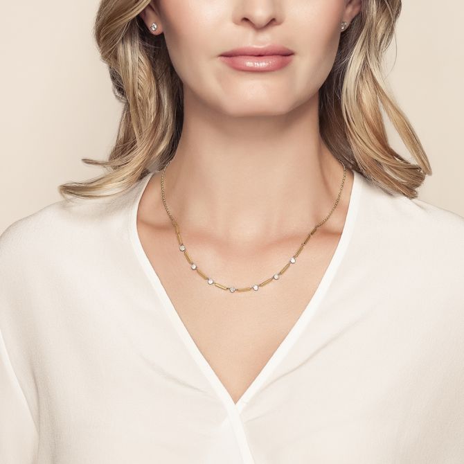 Woman wearing 18-inch diamond station necklace