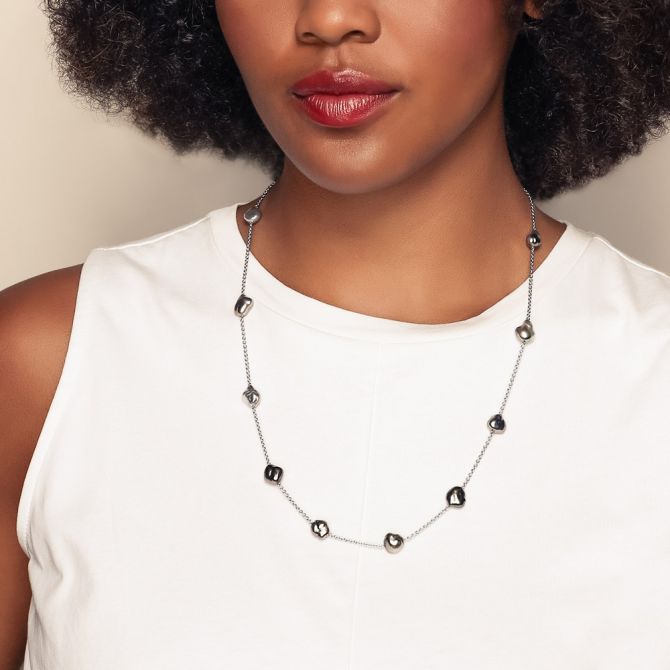 Matinee length pearl necklace 24"