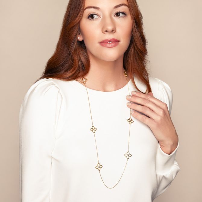 Woman wearing Roberto Coin station necklace