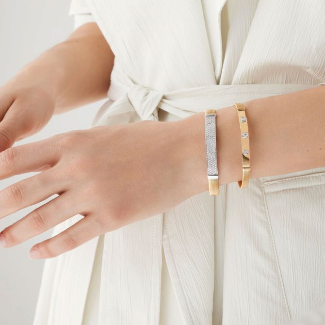 Two bangle bracelets styled together