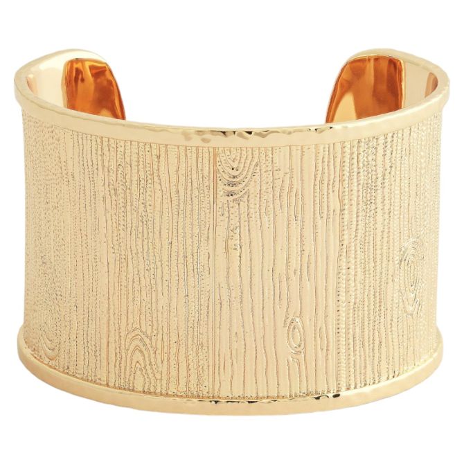 Wide gold cuff bracelet