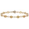 Oval Citrine 13 Stone Lace Link Bracelet in Yellow Gold