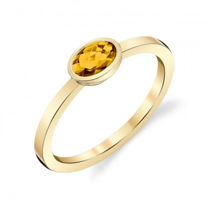 Oval Citrine Bezel Set Ring in Yellow Gold