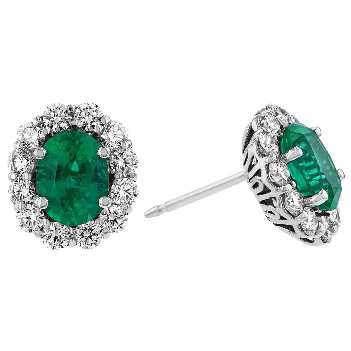 Oval Emerald & Diamond Halo Stud Earrings in White Gold