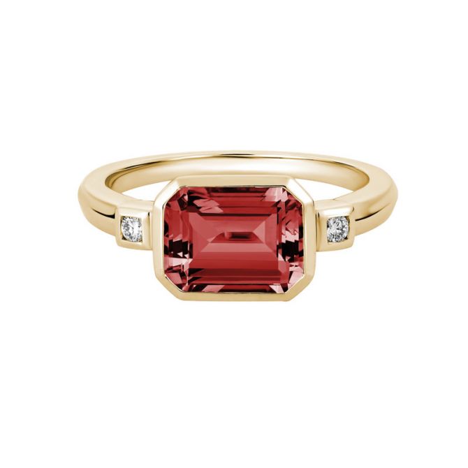 Emerald Cut Garnet & Diamond Side Stone Bezel Set 3 Stone Ring in Yellow Gold