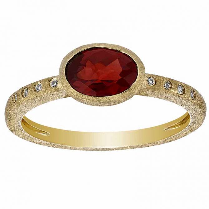 Oval Garnet Bezel Set Ring in Yellow Gold with Flush Set Diamond Sides