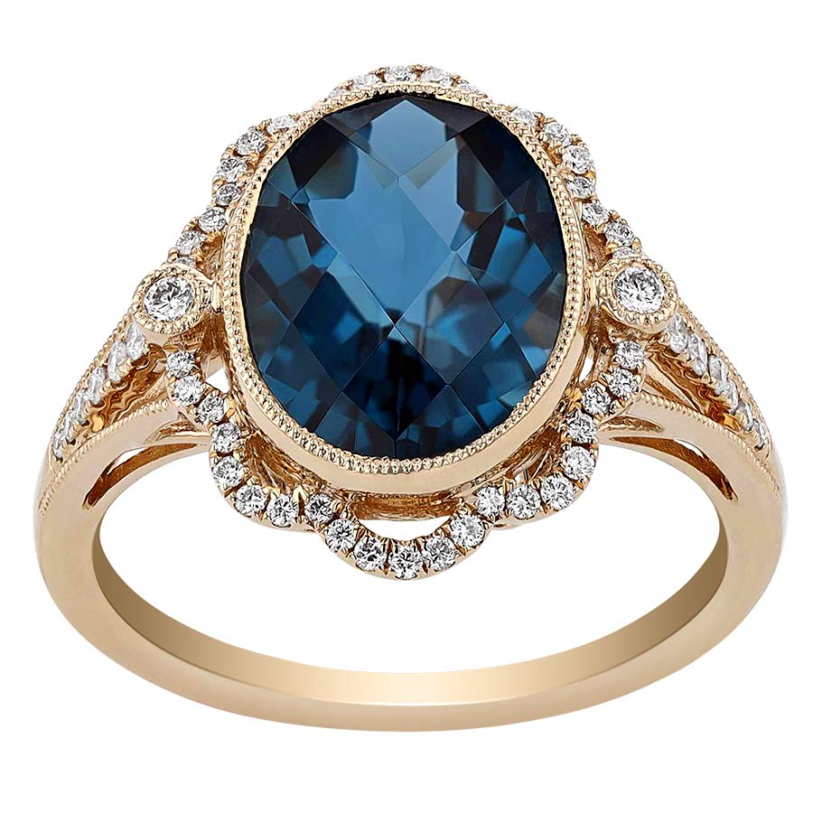 Oval London Blue Topaz Ring surrounded by Crystals Ring Size 7.