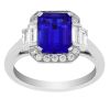 Emerald Cut Tanzanite Ring with Diamond Halo & Baguette Side Stones in White Gold