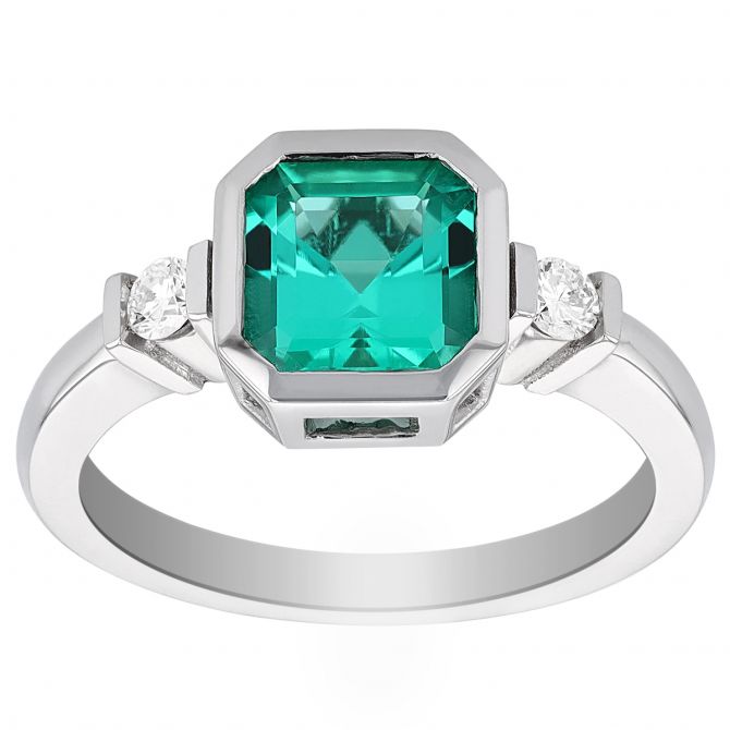 Asscher Cut Emerald & Diamond Side Stone Bezel Set Ring in White Gold