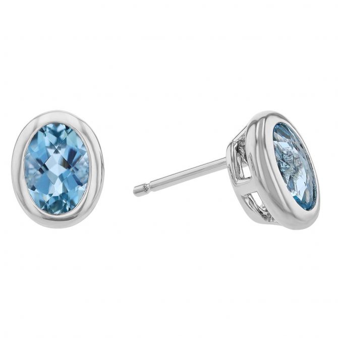 Oval Aquamarine Bezel Set Stud Earrings in White Gold