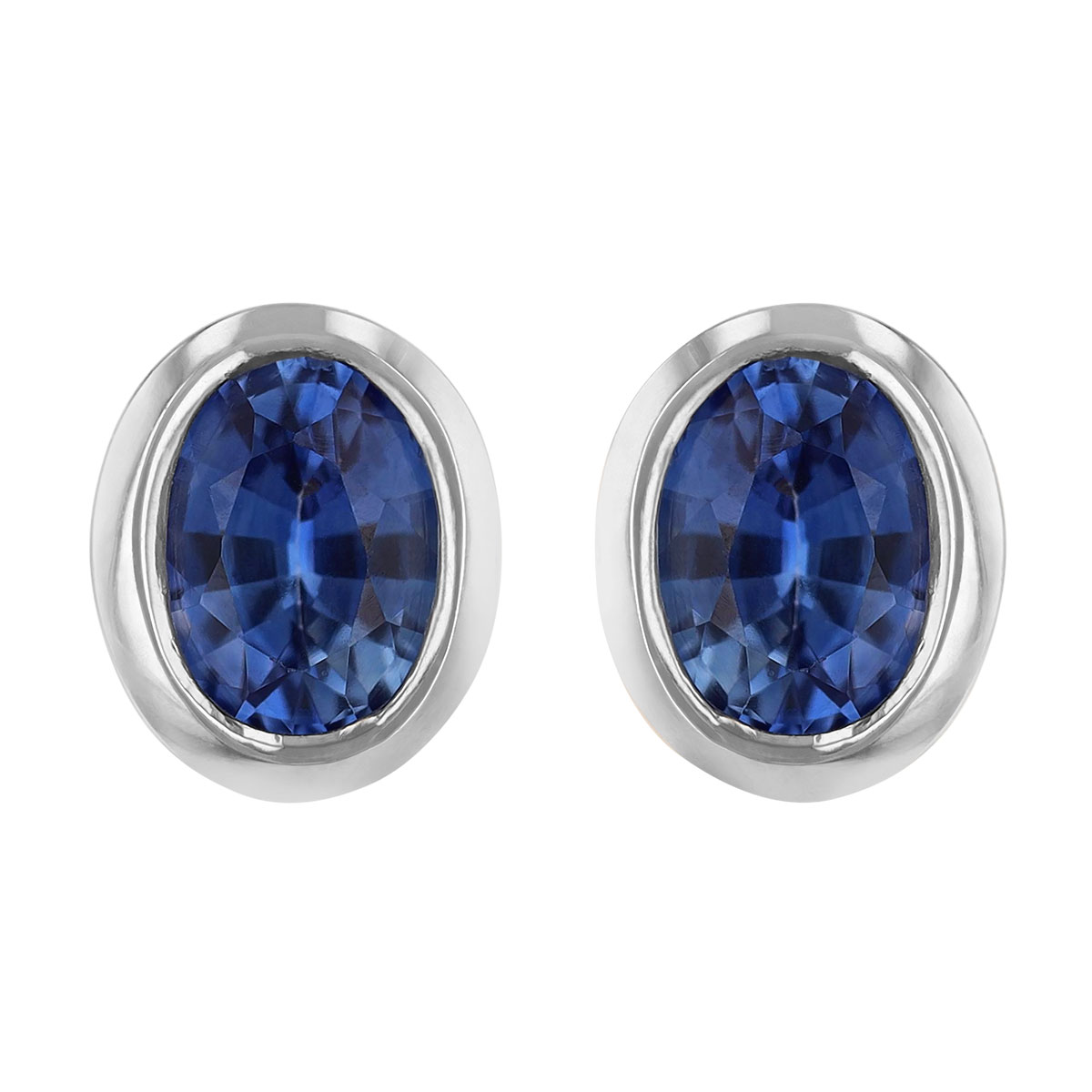 Oval Sapphire Bezel Set Stud Earrings in White Gold