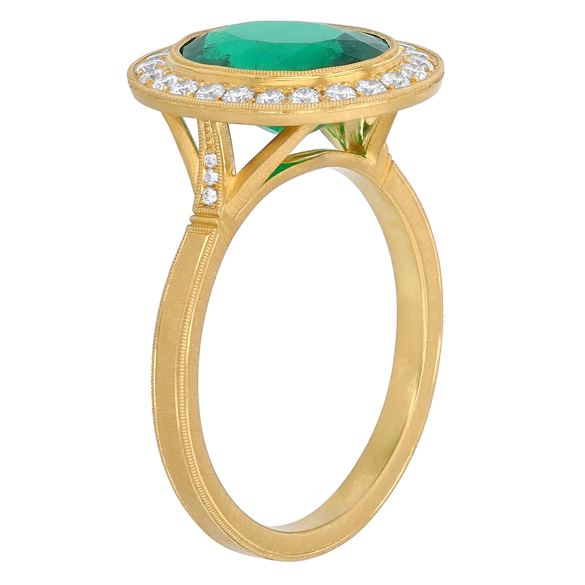 Oval Emerald & Diamond Halo Ring in Yellow Gold