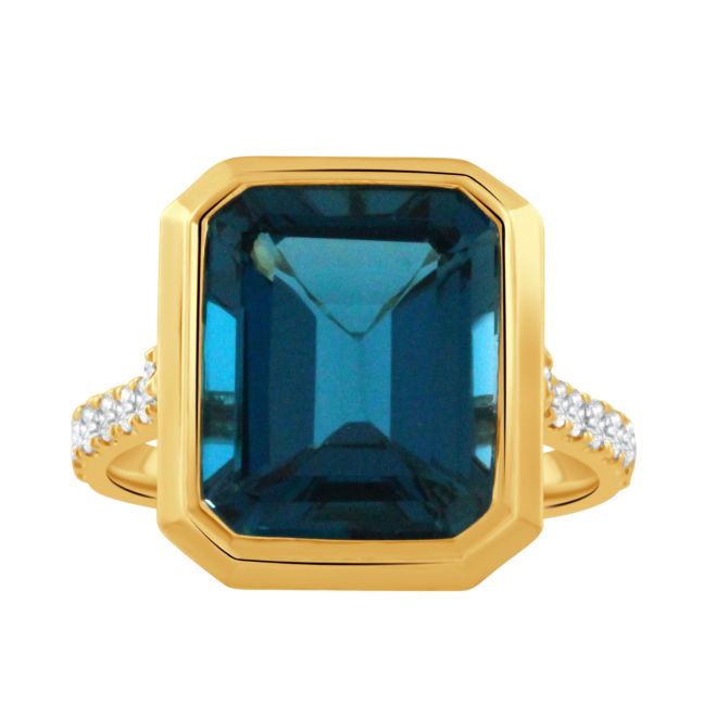 Doves London Blue Emerald Cut Topaz Bezel Set Ring in Yellow Gold with Diamond Shank