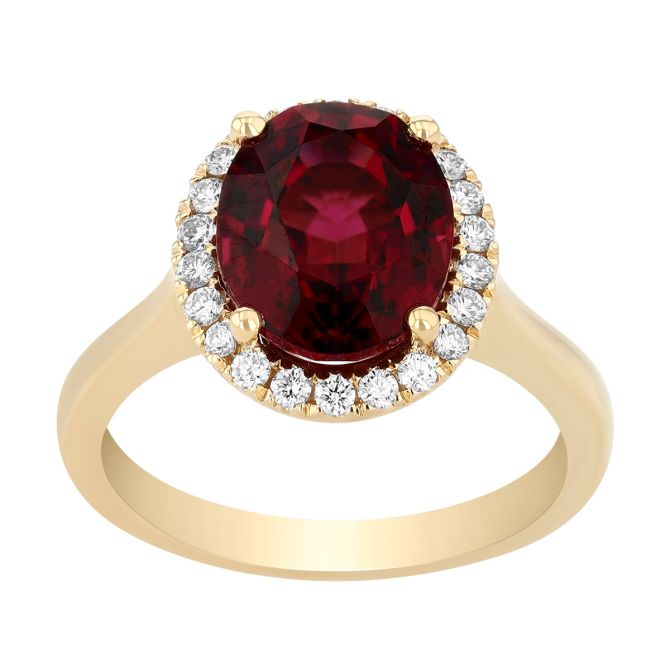 Oval Garnet & Diamond Halo Ring in Yellow Gold