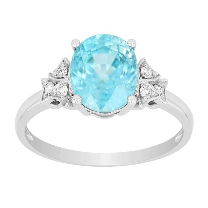 Oval Blue Zircon & Diamond Side Stone Ring in White Gold