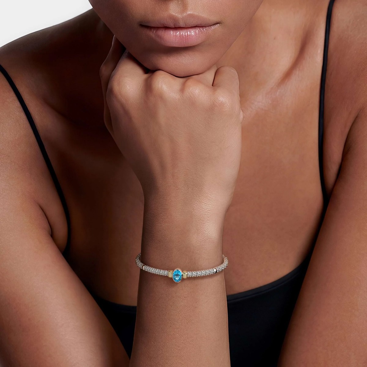 LAGOS Signature Caviar Two-Tone Swiss Blue Topaz Oval Mini Versa Torque Bracelet, 3 mm, Size M
