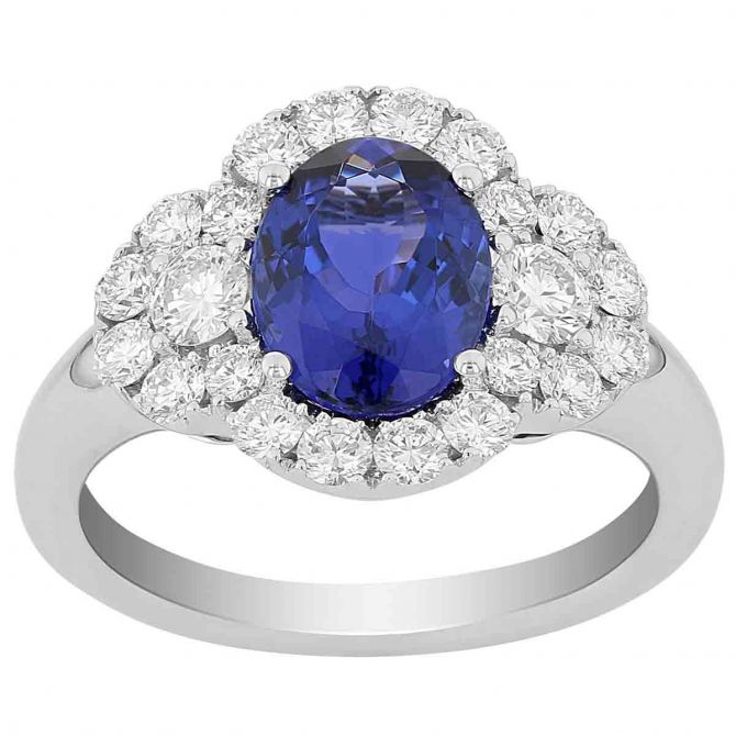 Oval Tanzanite & Diamond Halo 3 Stone Ring in White Gold
