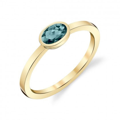 Oval London Blue Topaz Bezel Set Ring in Yellow Gold