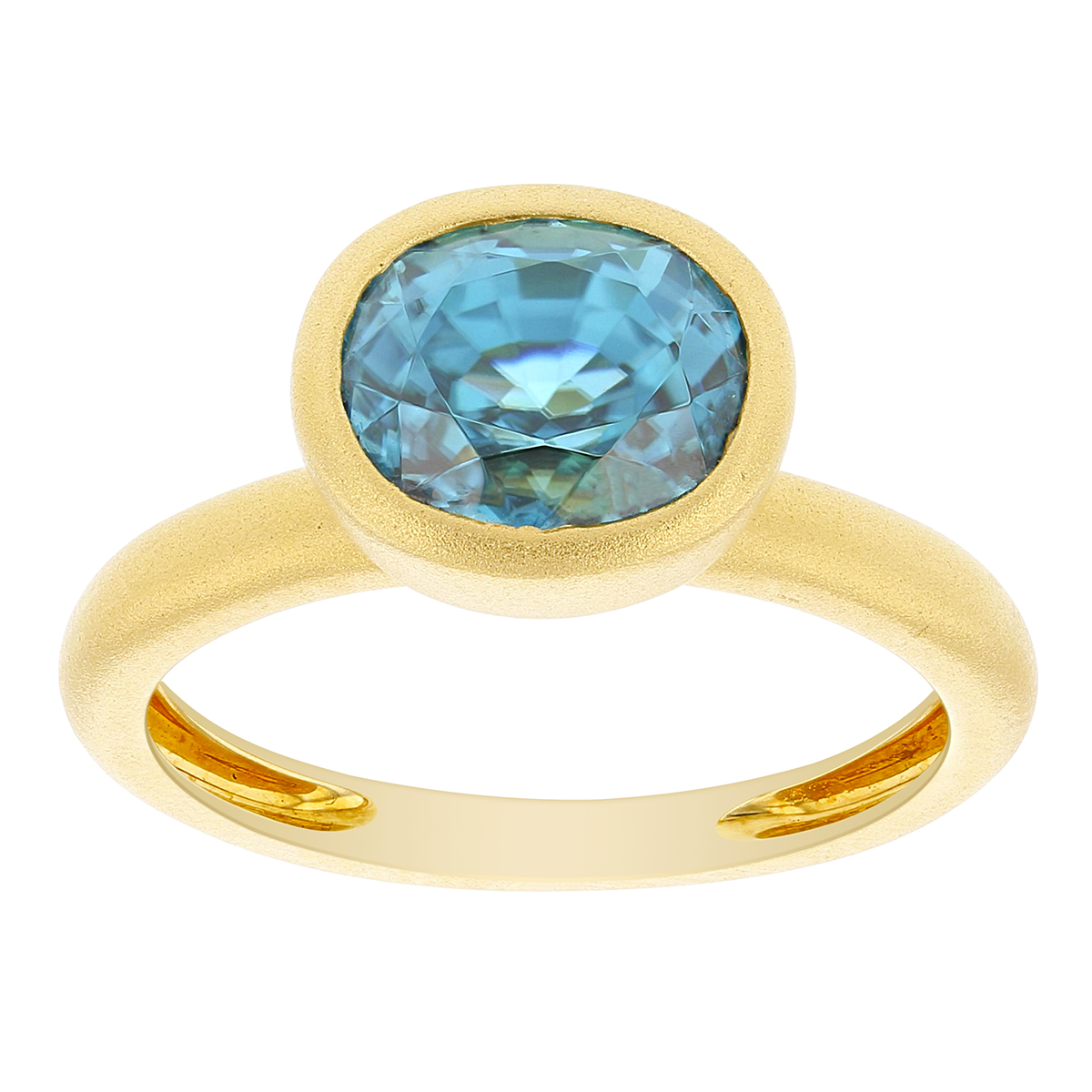 Oval Blue Zircon Bezel Set Ring in Matte Yellow Gold