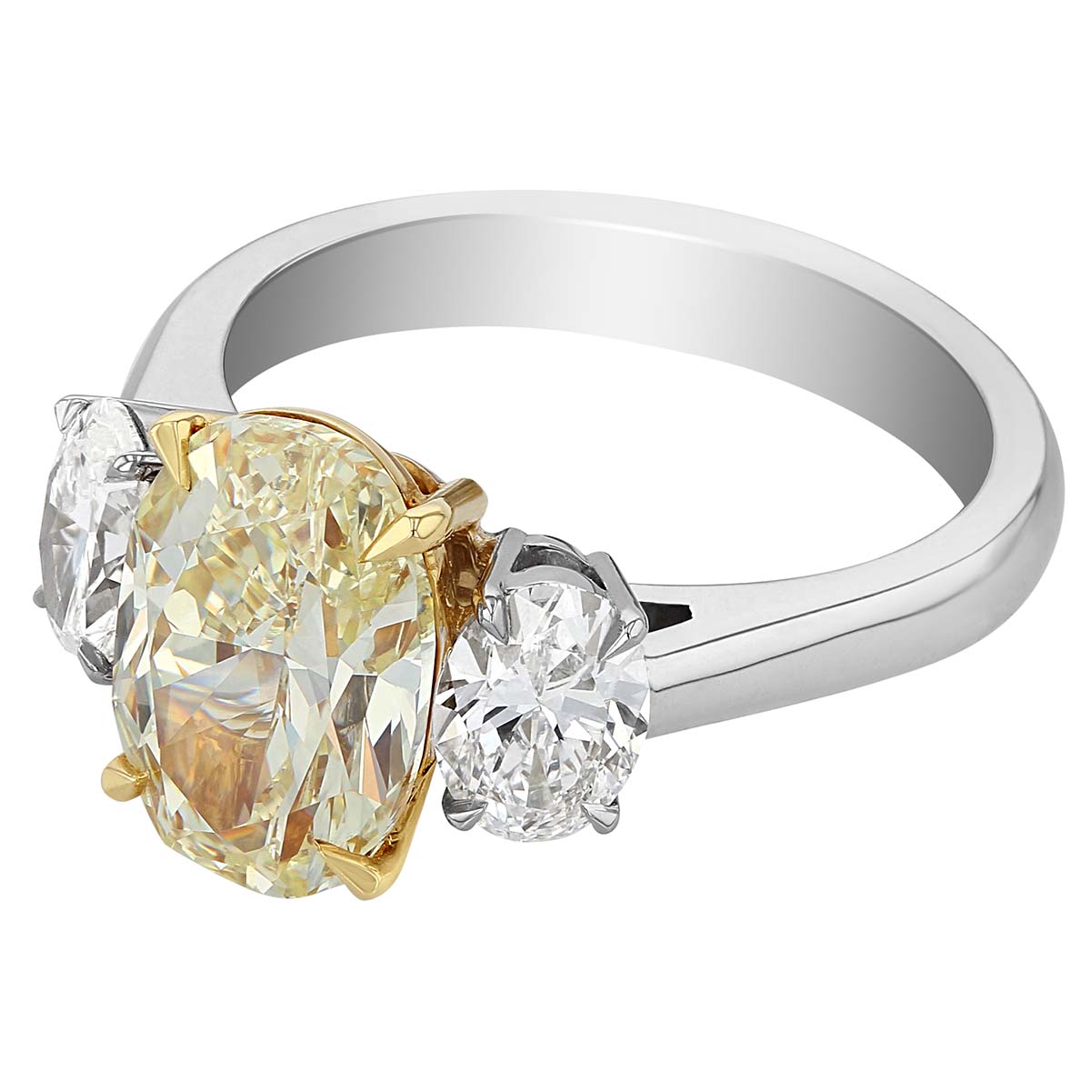 Fancy Light Yellow Oval Diamond 3 Stone Ring in Platinum