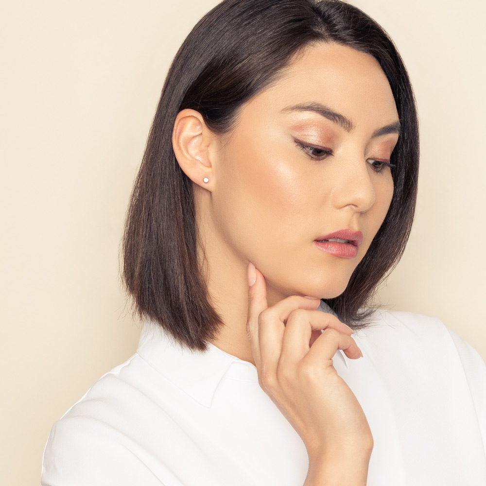 Diamond Bezel Set Stud Earrings in Yellow Gold