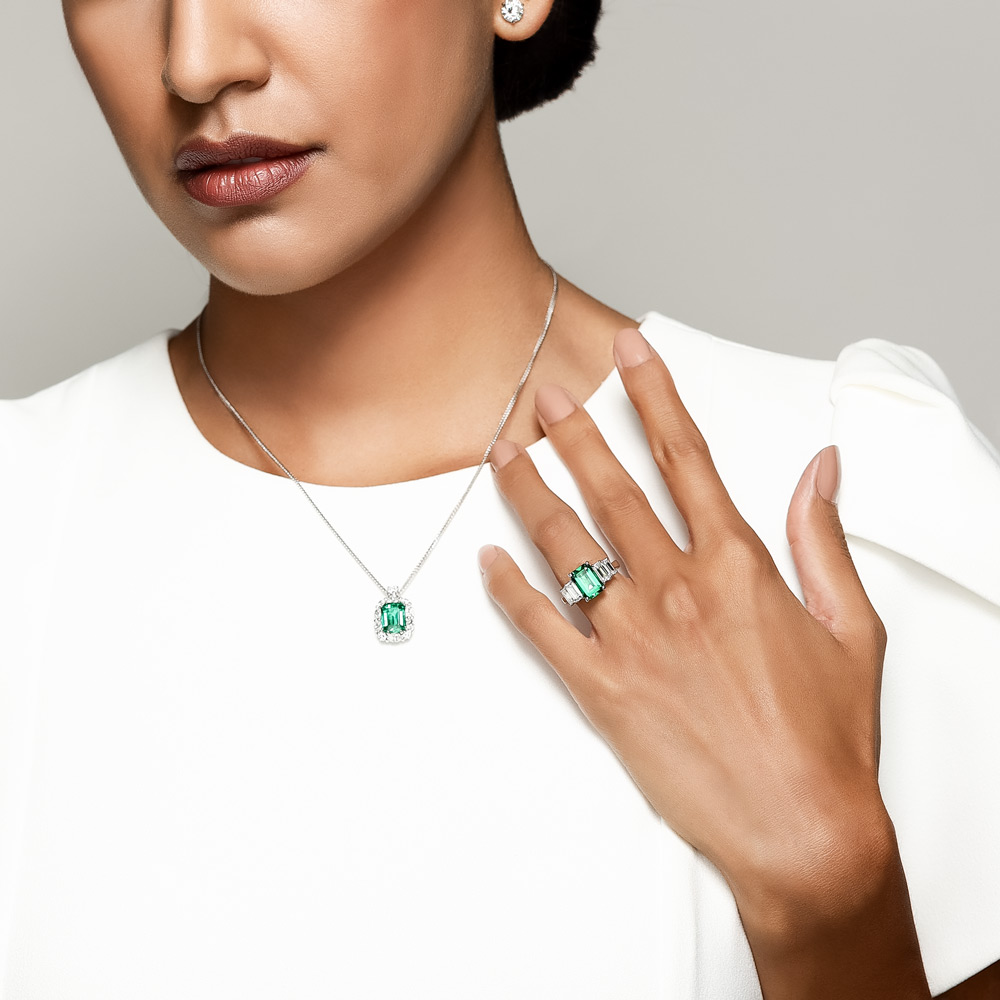J.B. Star Emerald Cut Emerald & Diamond 5 Stone Ring in Platinum