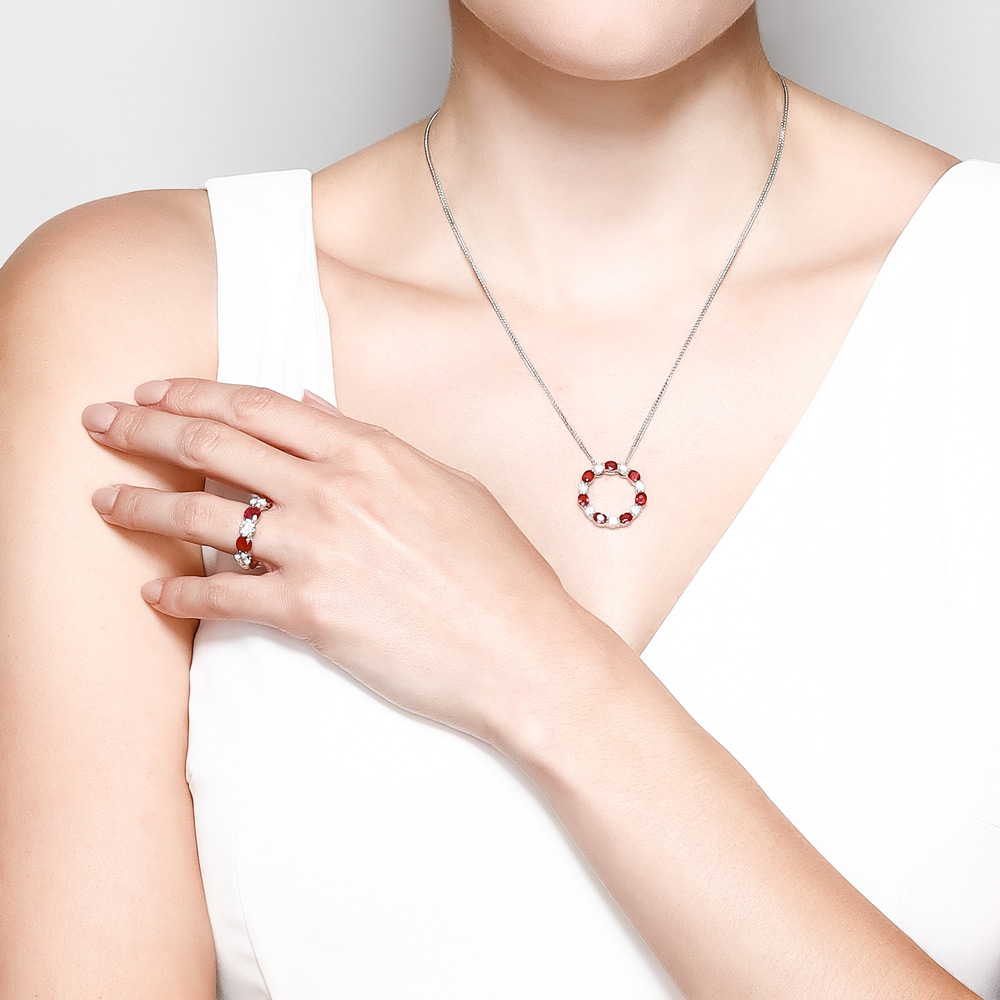 J.B. Star Cushion Ruby & Round Diamond Ring in Platinum