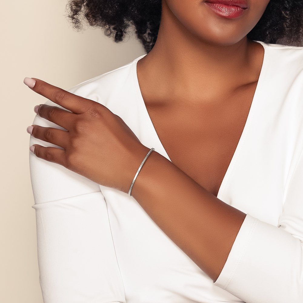 Baguette Diamond Channel Set Hinged Bangle Bracelet in White Gold