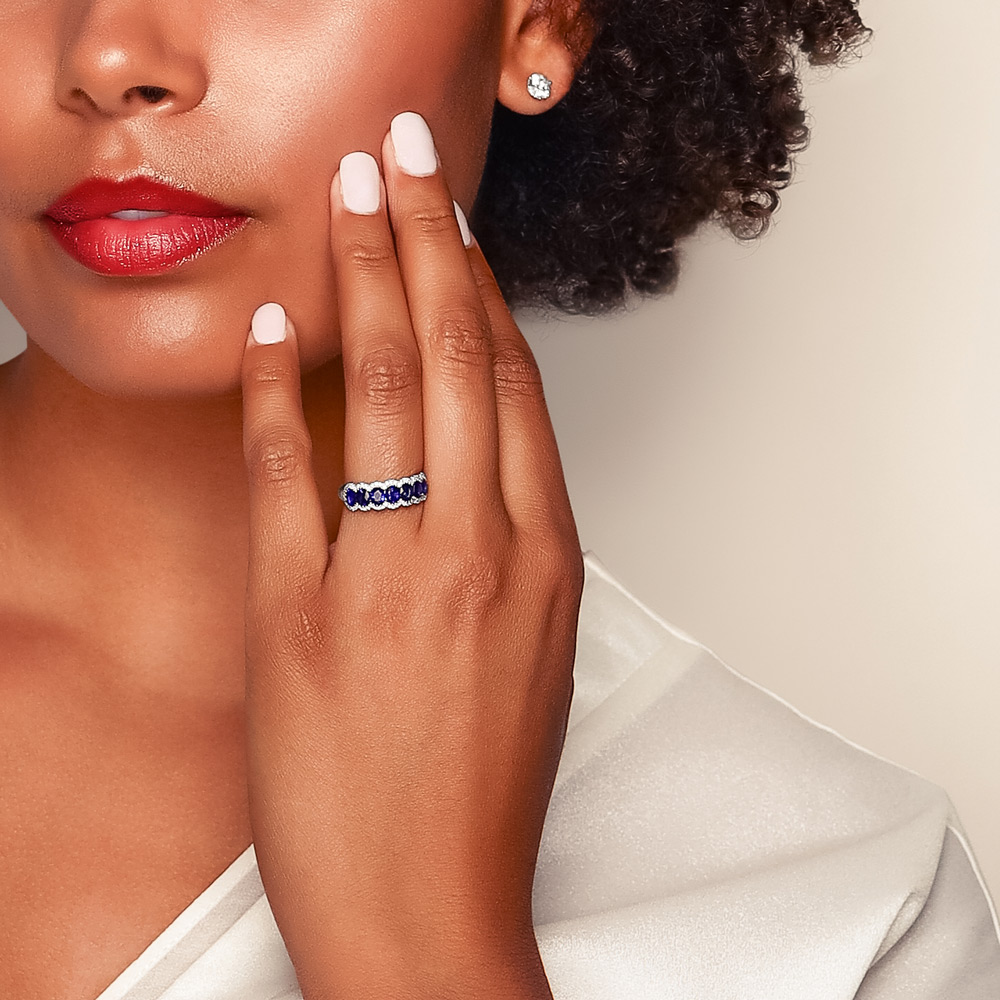 Oval Sapphire & Diamond Scalloped Halo Ring in White Gold