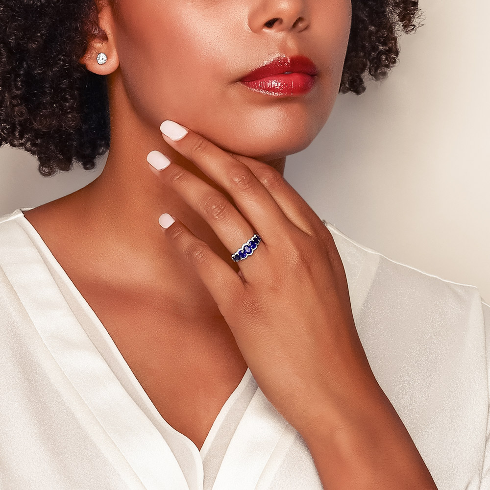 Oval Sapphire Graduated Ring with Scalloped Diamond Edges in White Gold