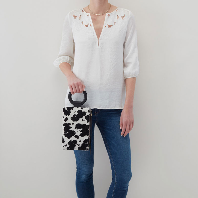 Hobo Storm Wristlet, Cow Print Black and White