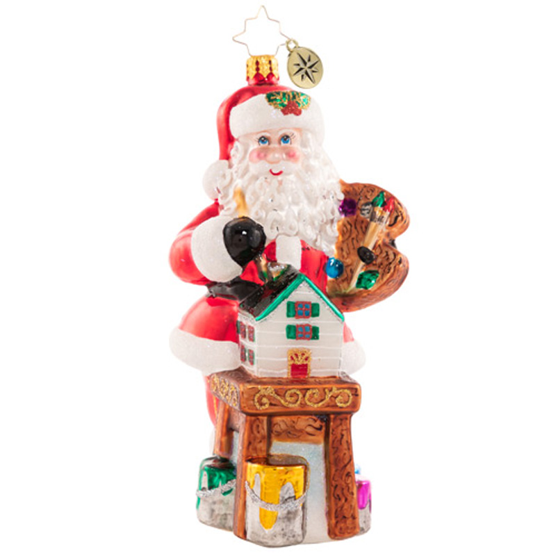 Christopher Radko Finishing Touches On Christmas Ornament