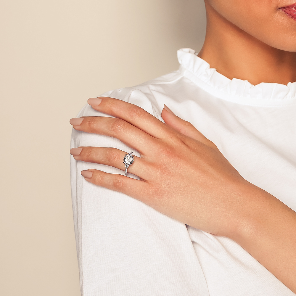 Round & Pear Shape Diamond Side Stone Engagement Ring in White Gold