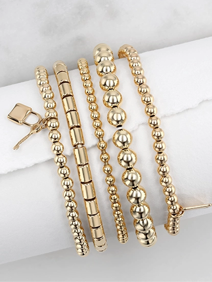 Layered Gold Bracelets