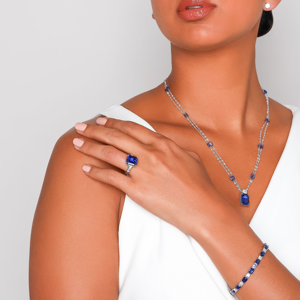 J.B. Star Emerald Cut Sapphire & Tapered Baguette Diamond 3 Stone Ring in Platinum