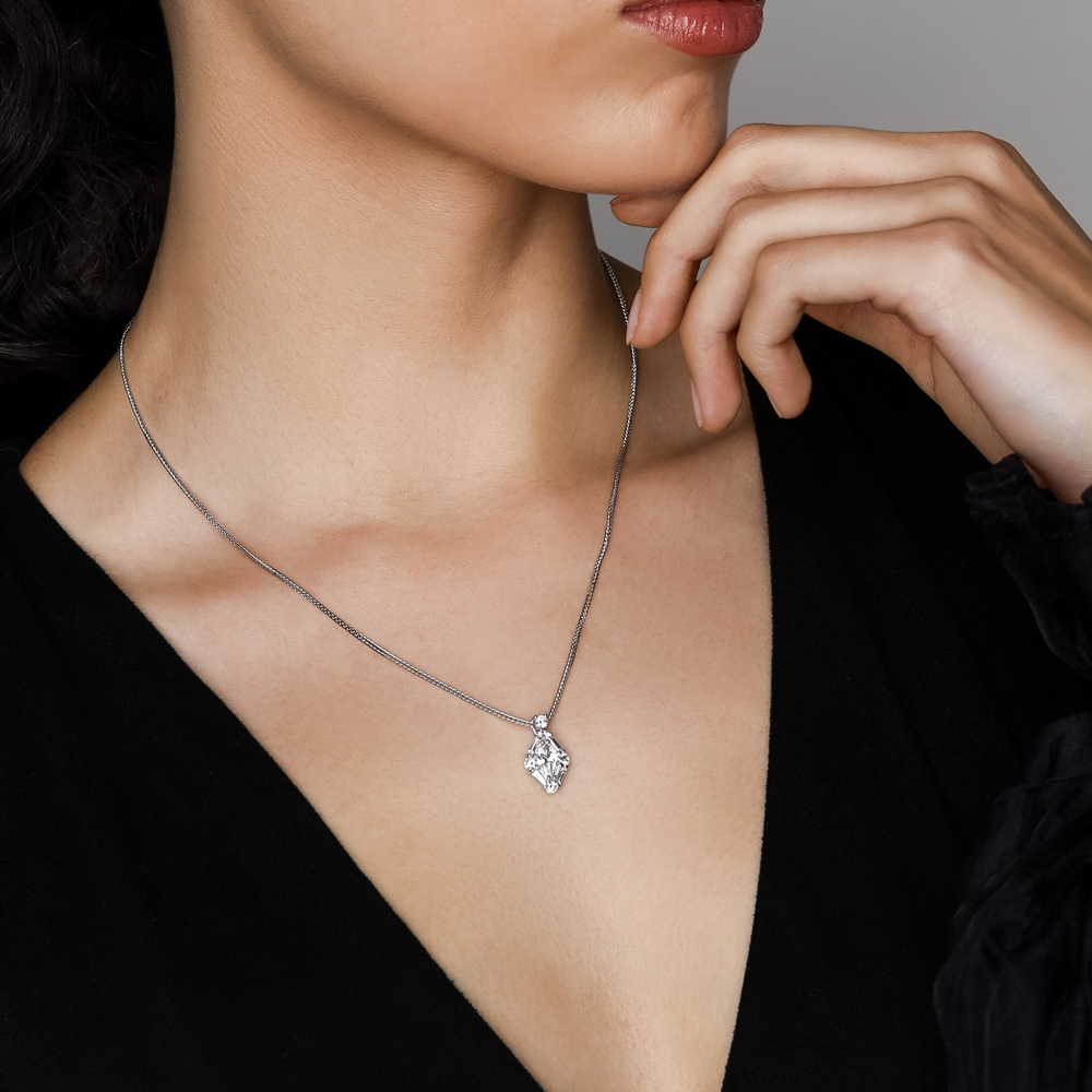 J.B. Star Marquise, Tapered Baguette, & Round Diamond Pendant in Platinum, 18